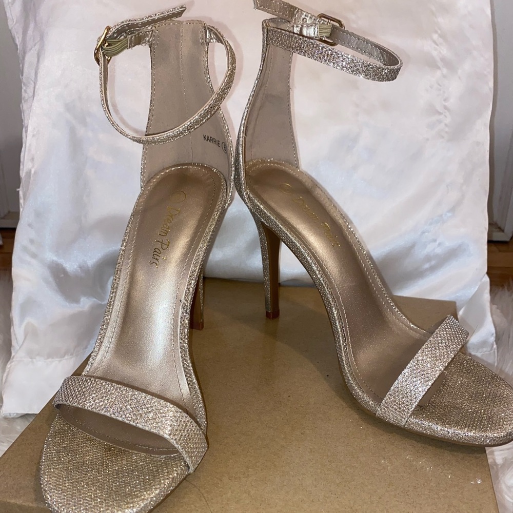 Champagne colored, shiny open toe heels!